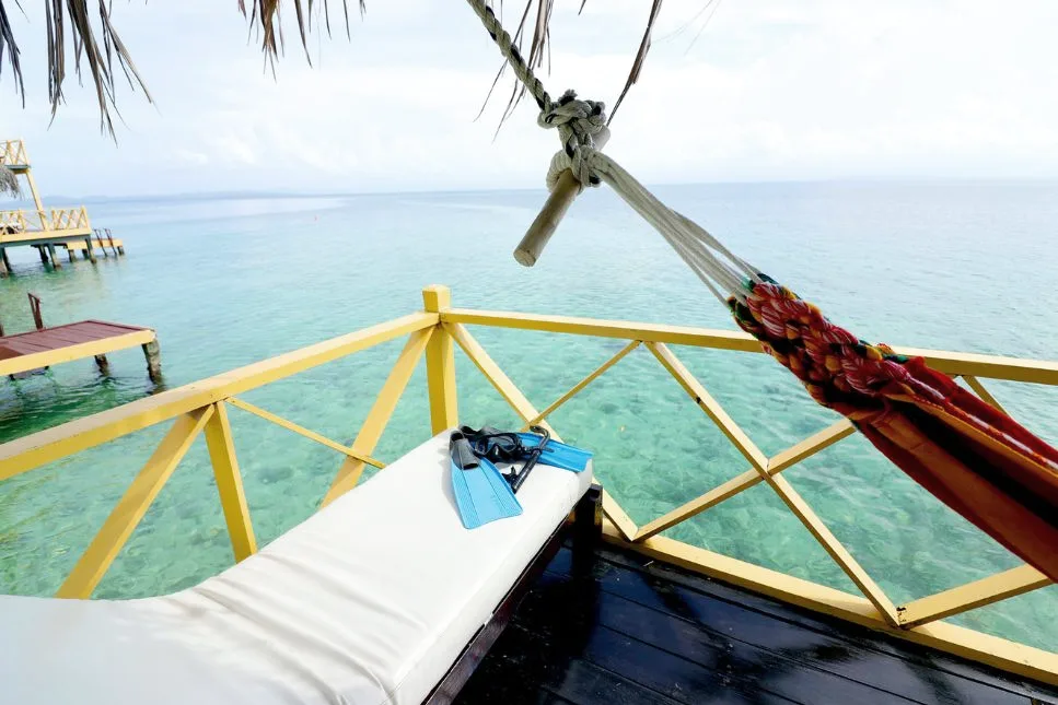 View from a palafito terrace with a hammock over the Caribbean Sea